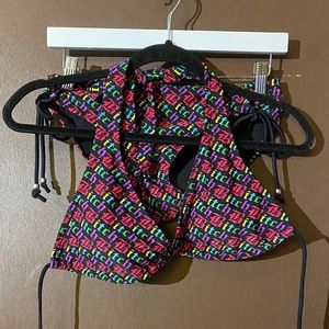 “B****” bathing suit